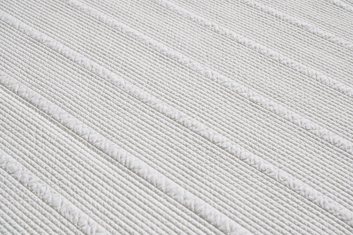 Close-up of white DANJAM rayon bedding texture