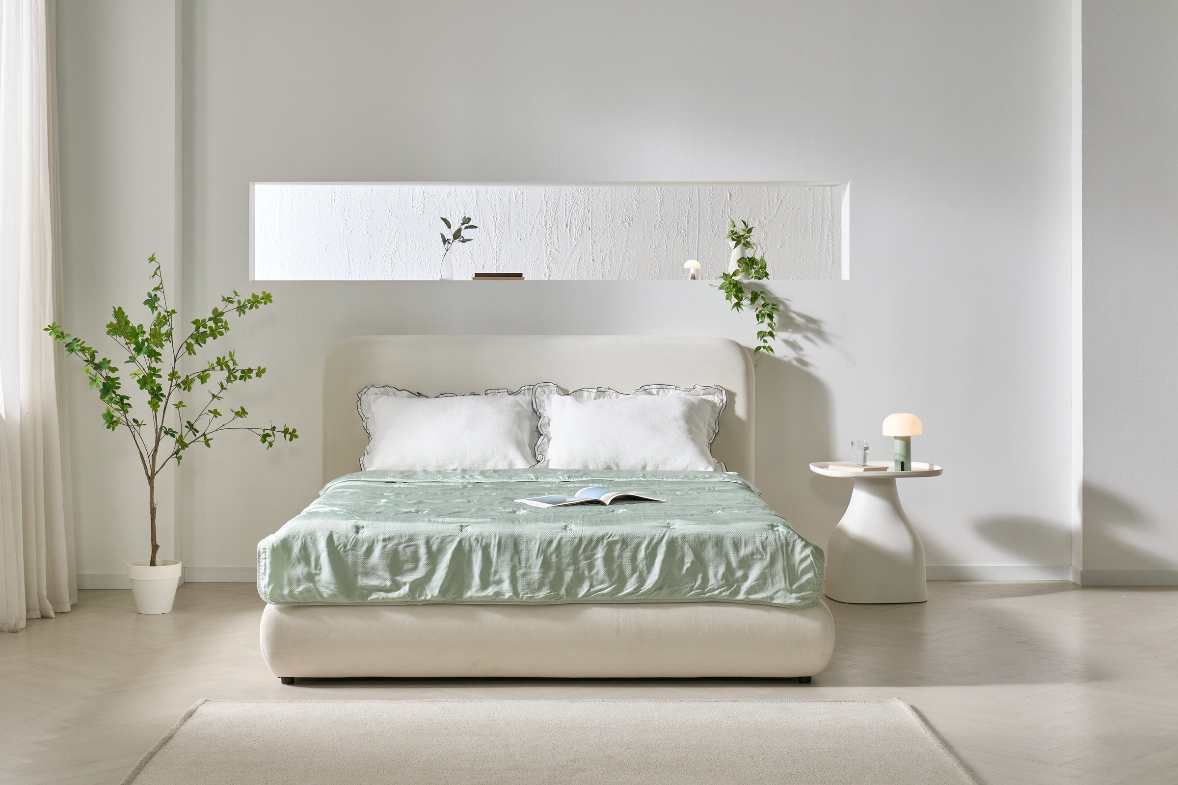 DANJAM mint bedding in a quiet studio room